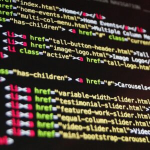 Close-up of HTML code highlighted in vibrant colors on a computer monitor.